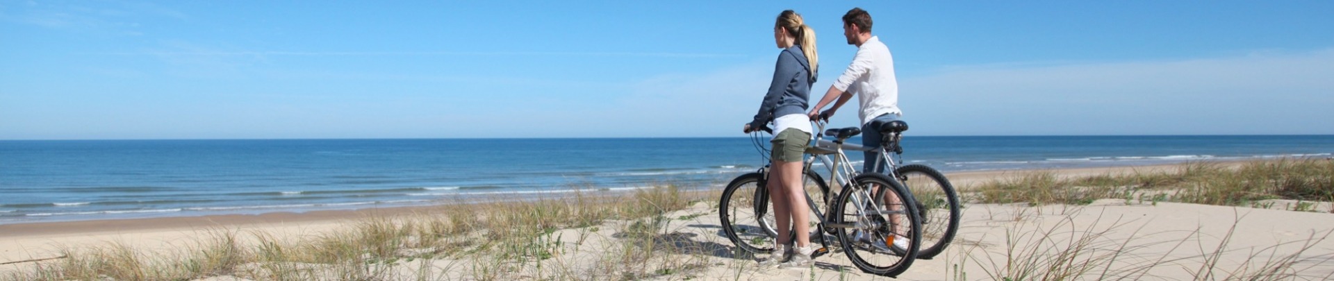 Fietsen aan het strand